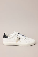Outer-side view of these sneakers that feature a rounded toe, a laceless design, a comfortable fit, and a star detail.