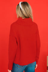 Back view of this sweater that features a super soft knit fabric.