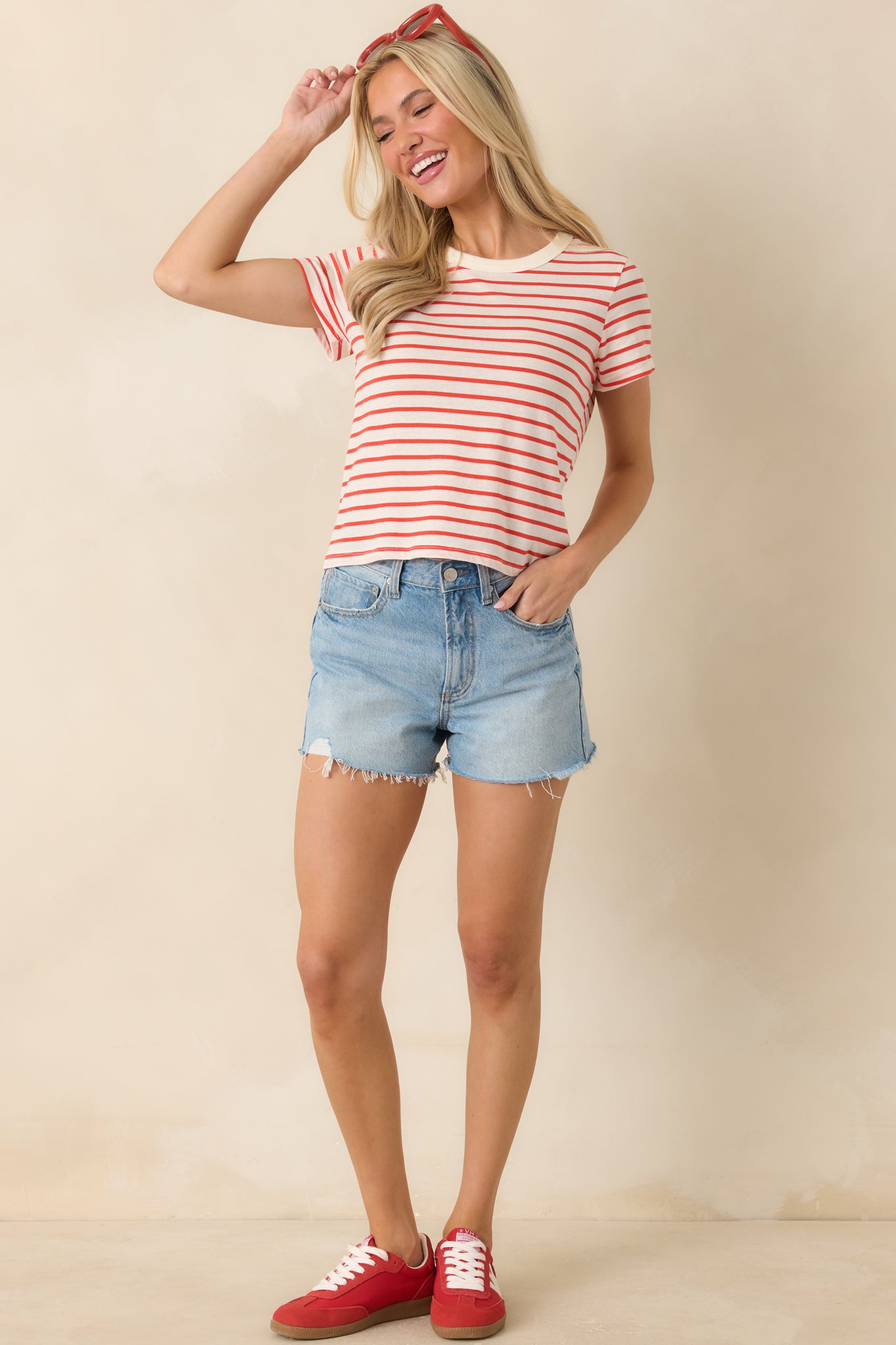 Front-facing view emphasizing the laid-back shape and timeless striped design for effortless wear.