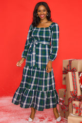 Front view of this dress that showcases the plaid pattern in shades of green, blue, and white.