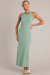 This green dress features a scoop neckline, a slit in the back and, a super soft material.
