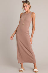 Angled view of this dress that features a scoop neckline, a slit in the back and, a super soft material.