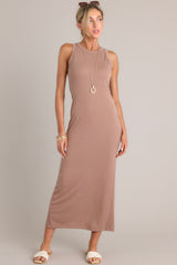 Full view of this dress that features a scoop neckline and a slit in the back.