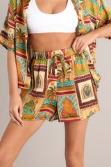 These multi-colored shorts feature a high waisted design, a drawstring elastic waist, and functional front pockets.