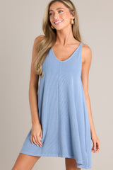 This blue ribbed dress features a v-neckline, a seam down the front and back and, a soft & lightweight material.