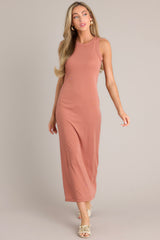 Full body view of this terracotta dress with a scoop neckline, a slit in the back, and made from super soft material.