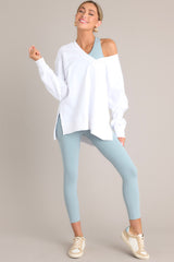 Full body view of these leggings that feature a seamless waistband and bottoms, side pockets, and a high waisted design.