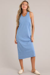 This blue dress features a ribbed scoop neckline, a super soft material, and a raw hemline.