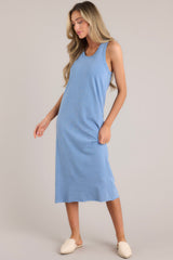 Angled full body view of this dress that features a ribbed scoop neckline, a super soft material, and a raw hemline.