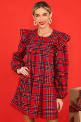 Front view of this dress that showcases the plaid pattern in shades of red, blue, and brown.