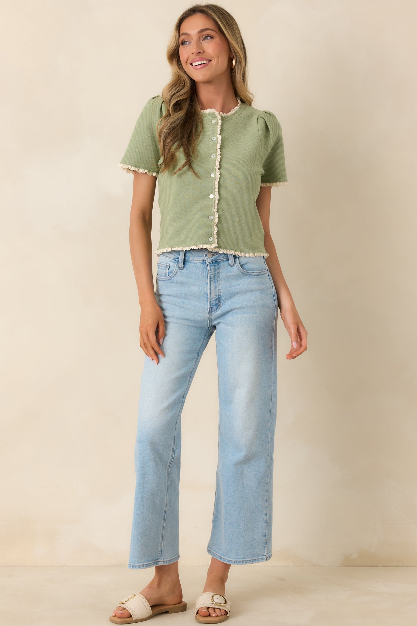 Classic knit top with delicate lace edging and comfortable everyday fit.