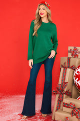 Full body view of this sweater that features a soft material and a relaxed fit.