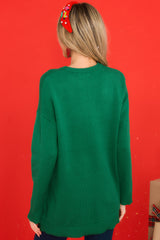 Back view of this sweater that features a round neckline, ribbed detailing around the neck and cuffs, soft material, and a relaxed fit.