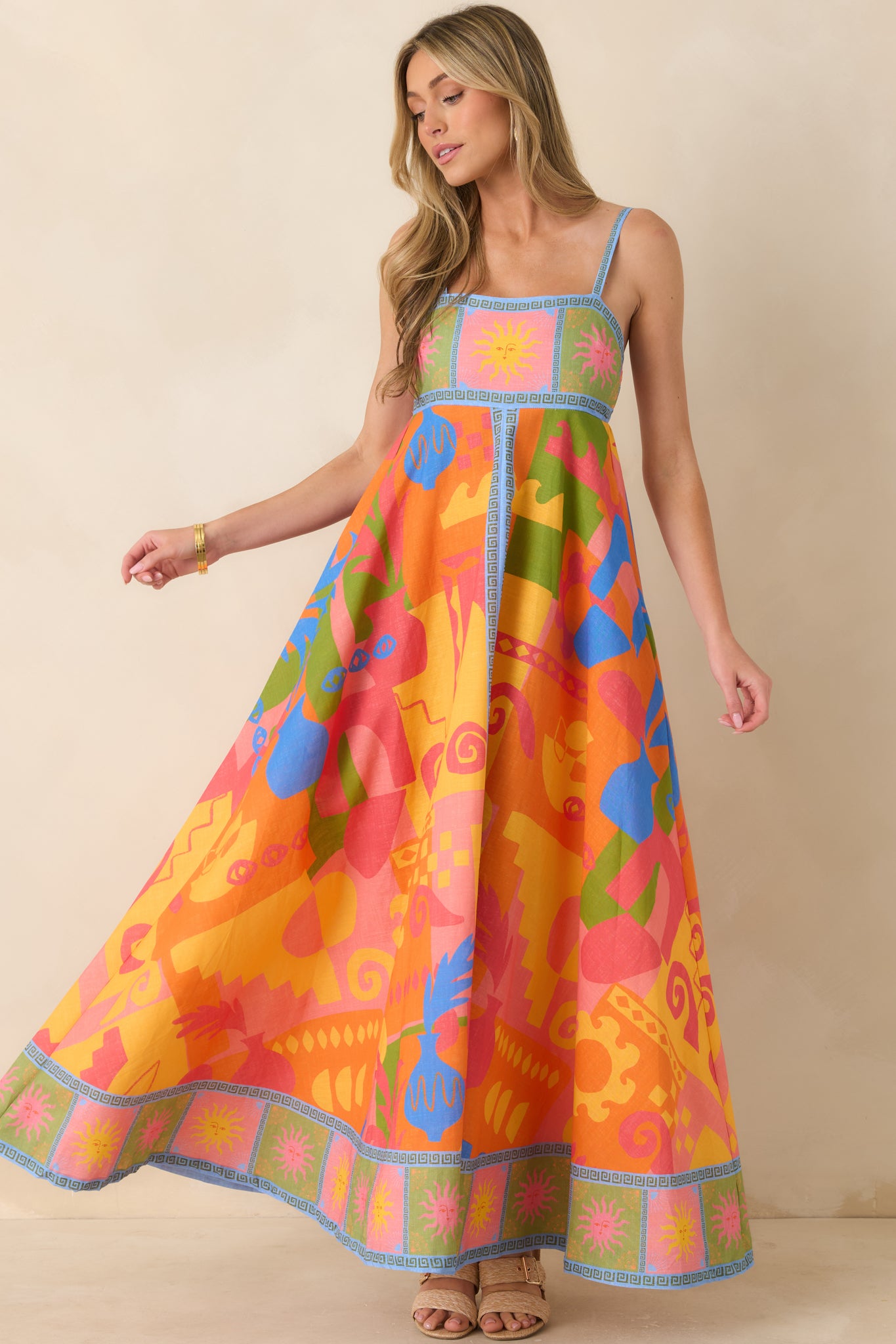 Cotton poplin maxi dress with vibrant abstract pattern and flattering structured fit.