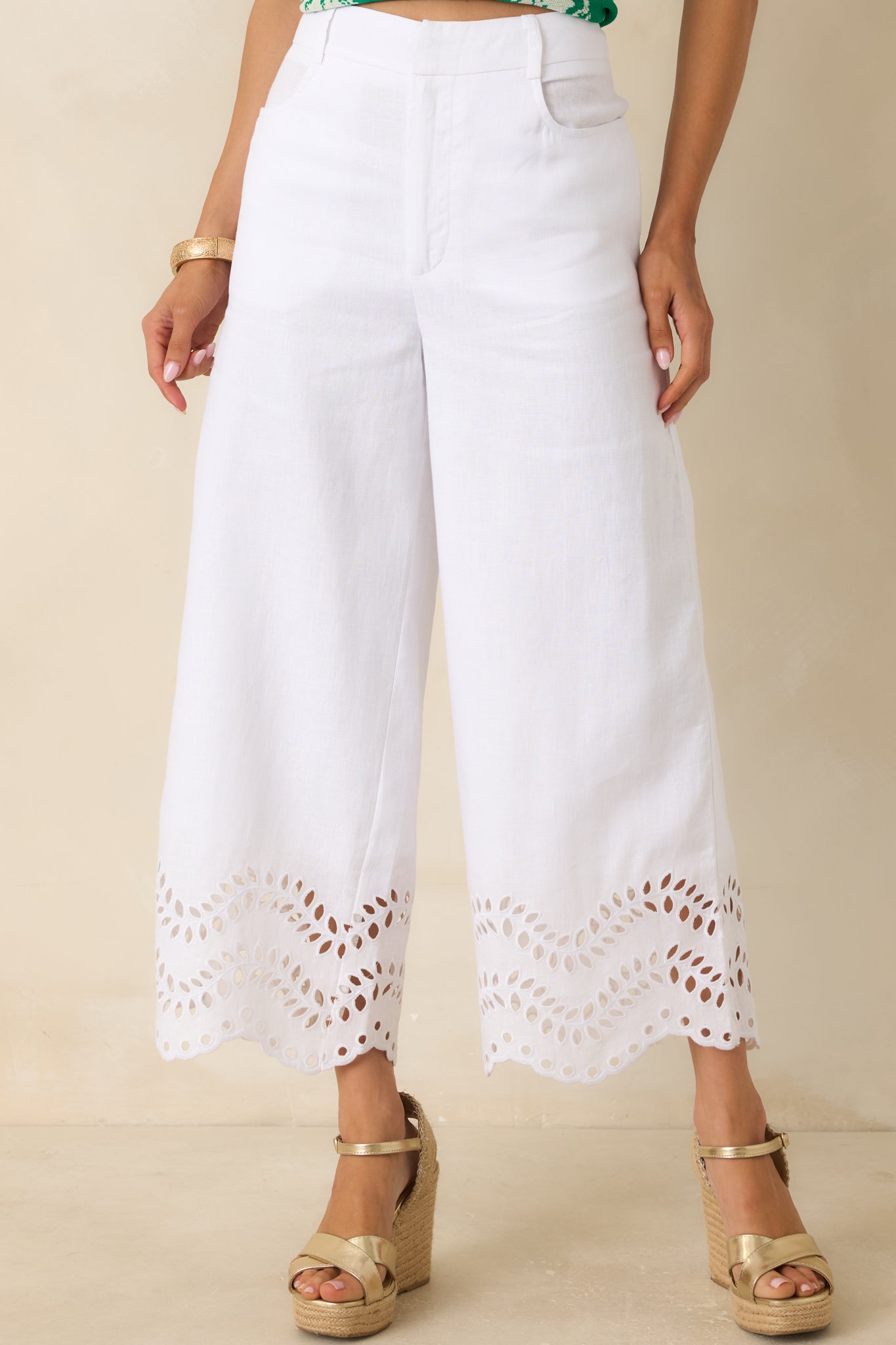 Cropped view highlighting the soft linen texture and clean wide leg construction.