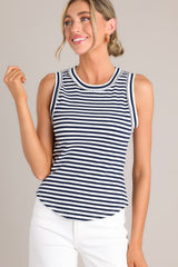 Full front view of this tank that features a ribbed scoop neckline, a classic stripe pattern, a ribbed texture, and a scoop hemline.