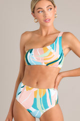 Front view of these multi-colored bottoms feature a high rise, moderate coverage, and a fun printed design. 