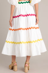 Back view of this skirt that features a high waist, a side zipper closure, and a flowed out skirt style.