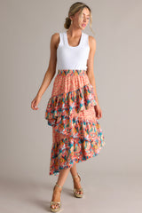 Full body view of  this skirt that features an elastic waistband and tiered ruffles.