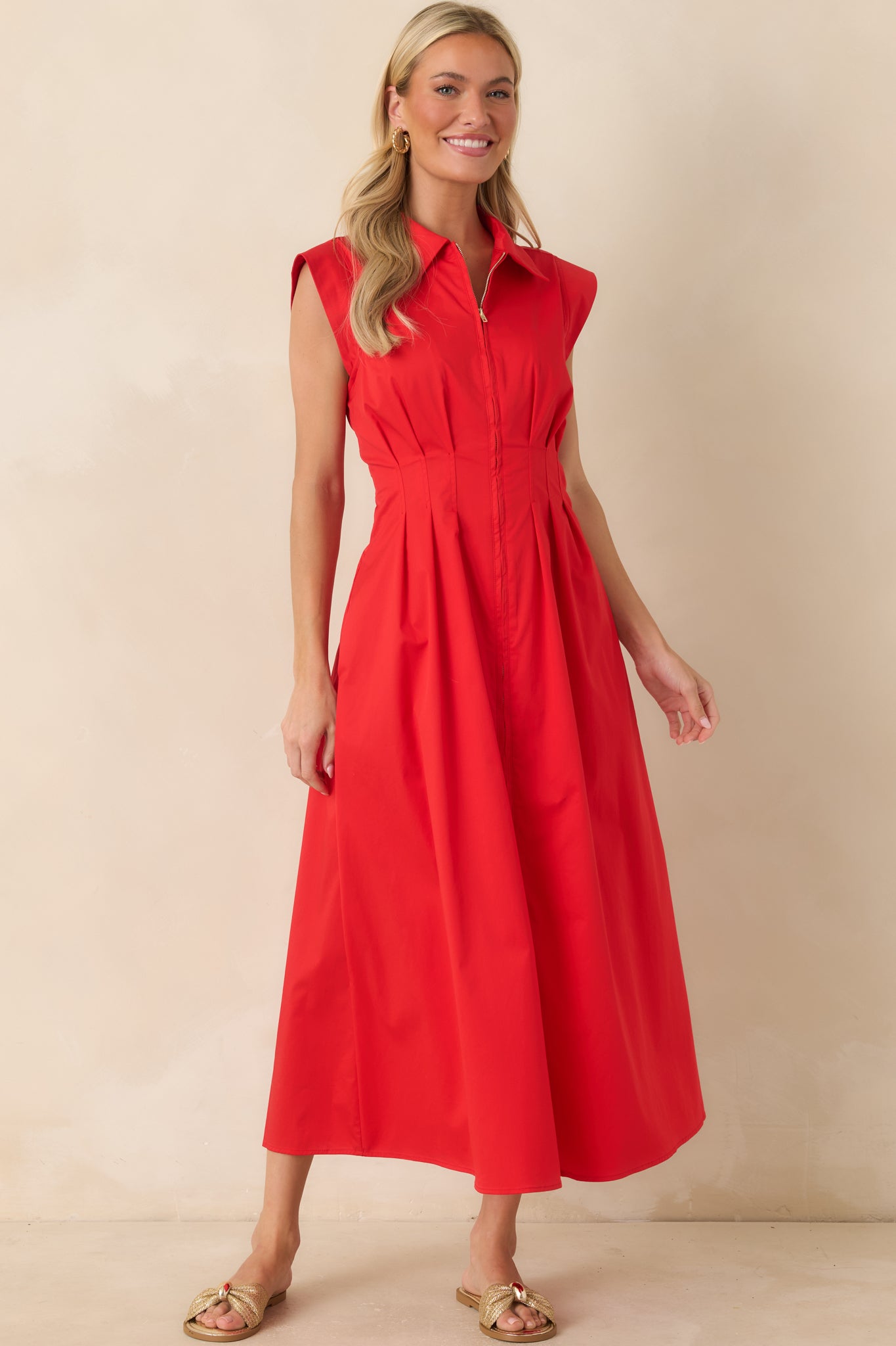 Chic statement dress with a polished silhouette suited for daytime and evening occasions.
