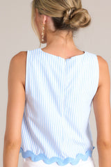 Back view of this light blue stripe tank that features a crew neckline, a wide sleeve, a discrete zipper down the back, and a ricrac hemline.