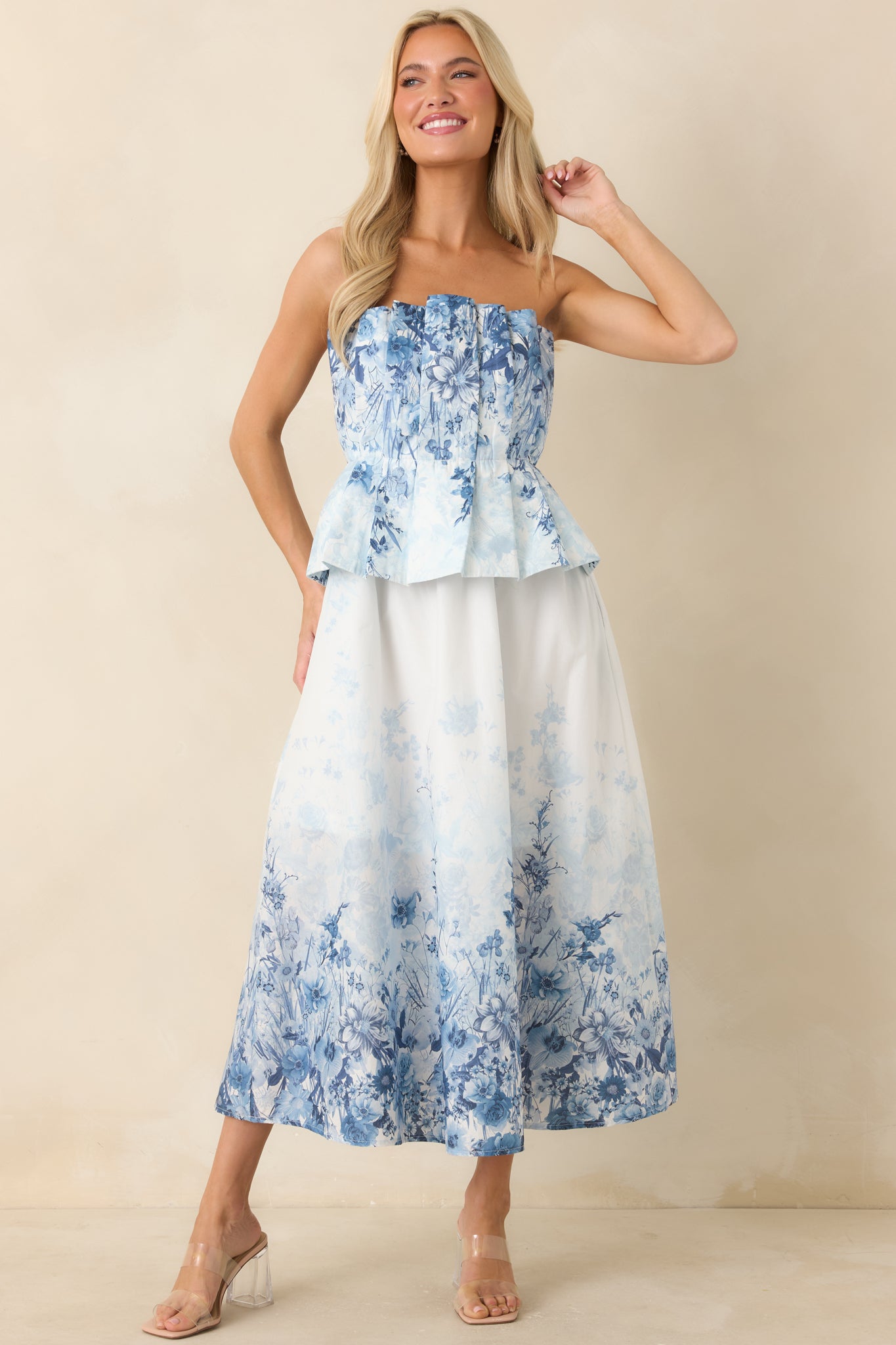 Blue floral cotton midi dress with strapless pleated bodice and elasticized waistband.