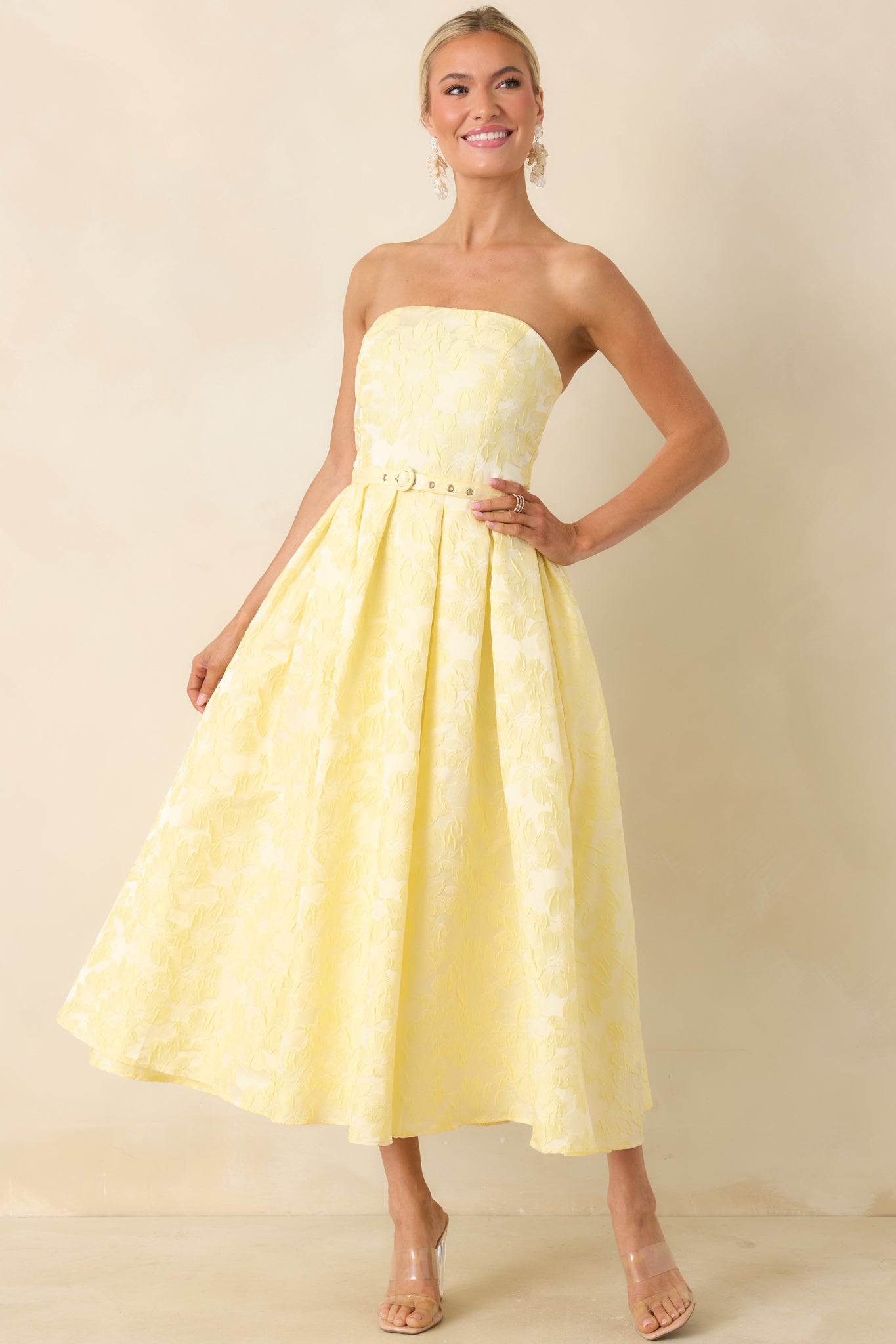 Classic strapless dress, with tailored bodice and softly pleated full skirt.