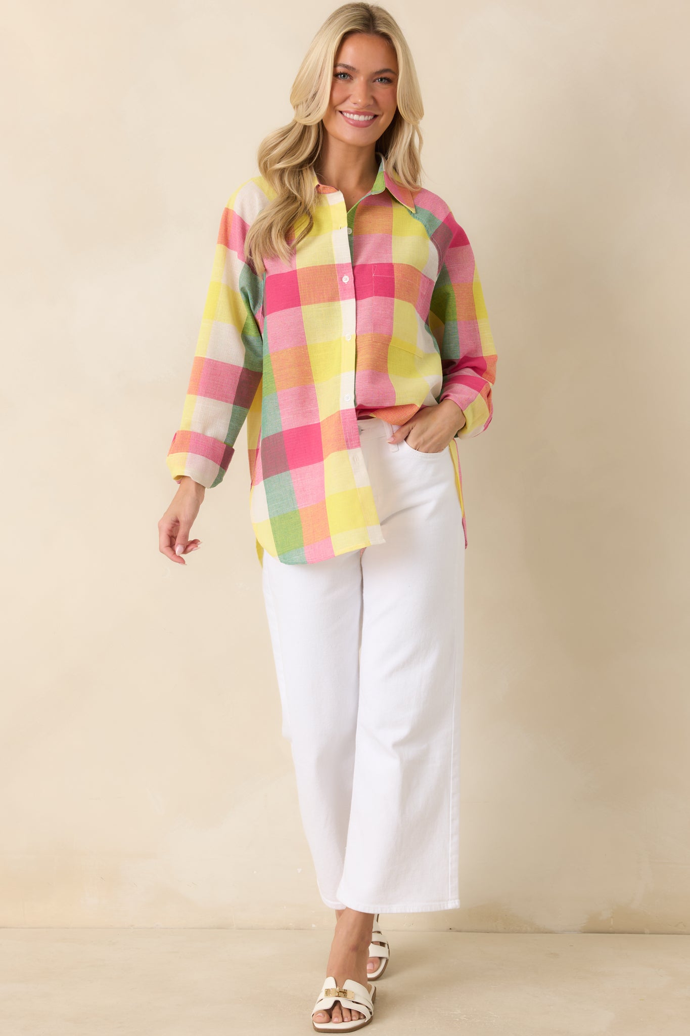 Vibrant plaid button-front shirt in 100% cotton with long sleeves and an easy relaxed fit.