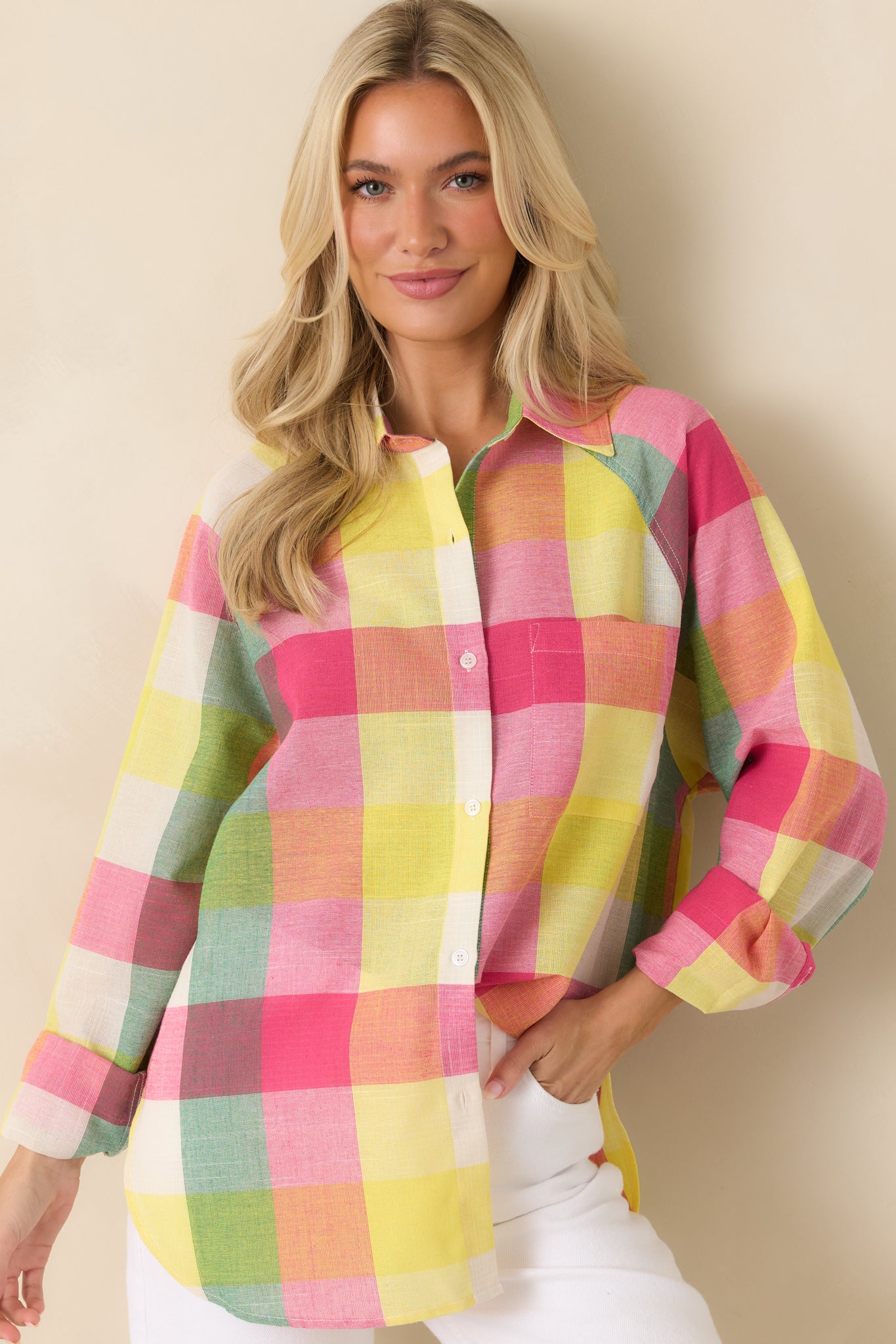 Pink multi plaid cotton shirt showcasing the classic collared neckline and full button-front placket.