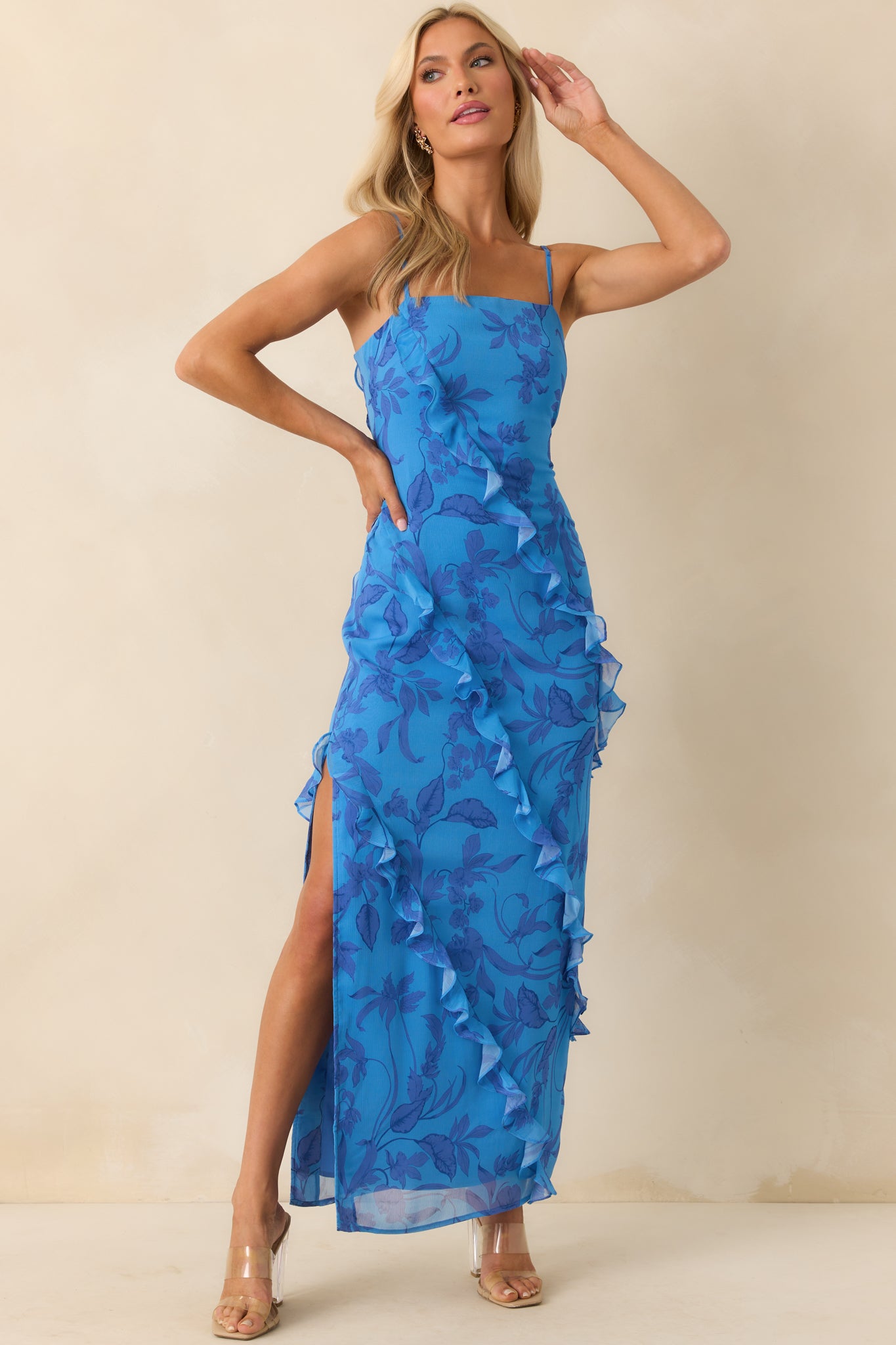 Full body shot showcasing the side leg slit and the way the ruffles open over the blue lining.