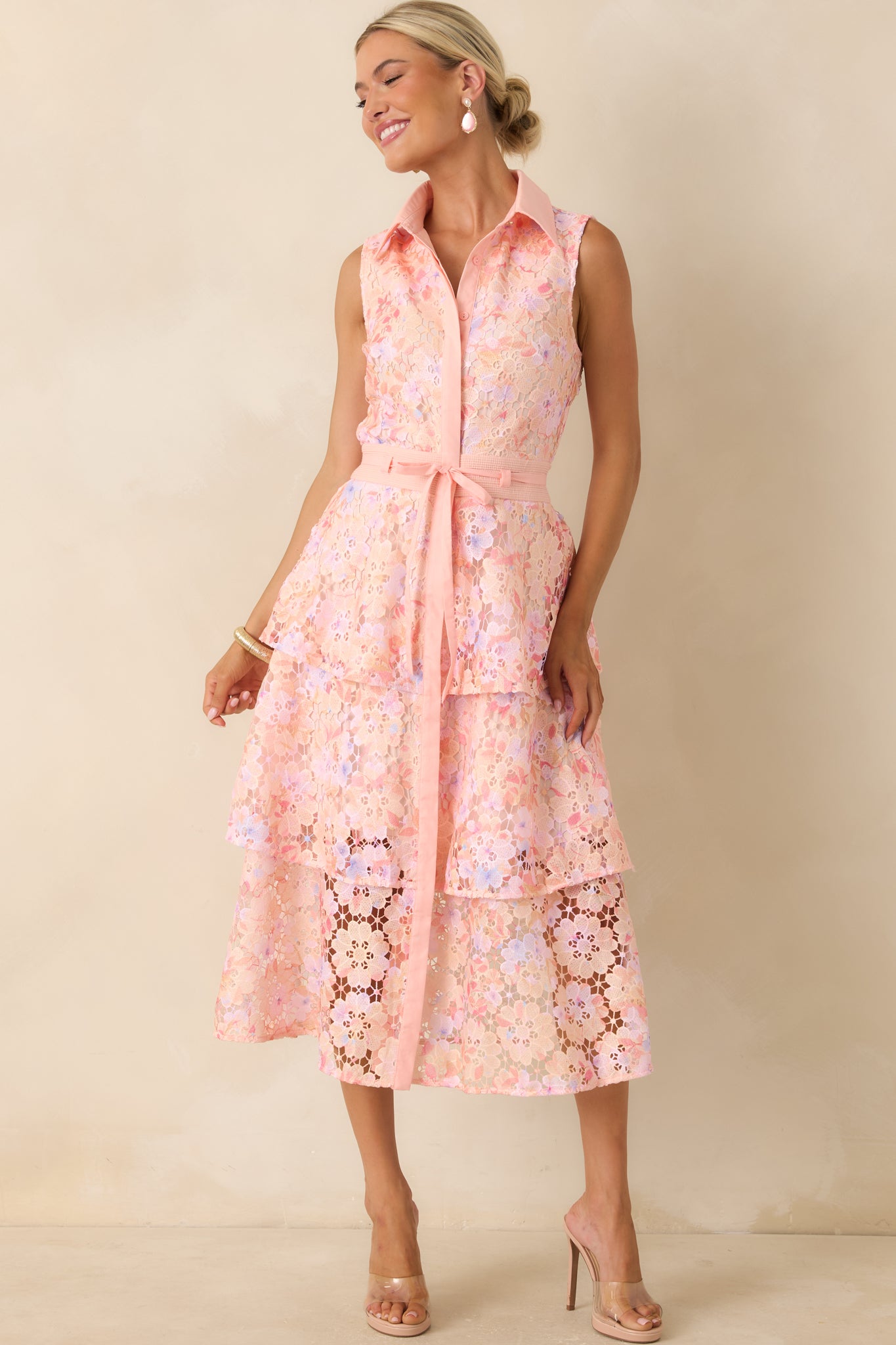 Floral lace midi dress with a tiered skirt design and removable waist tie for adjustable shaping.