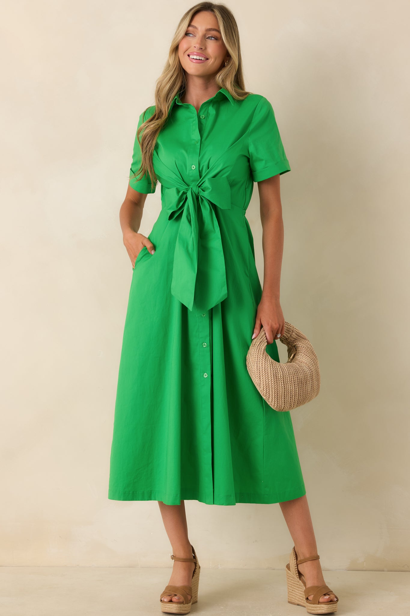 Cotton-blend shirt dress featuring an elasticized back waist and midi-length skirt for comfortable shaping.