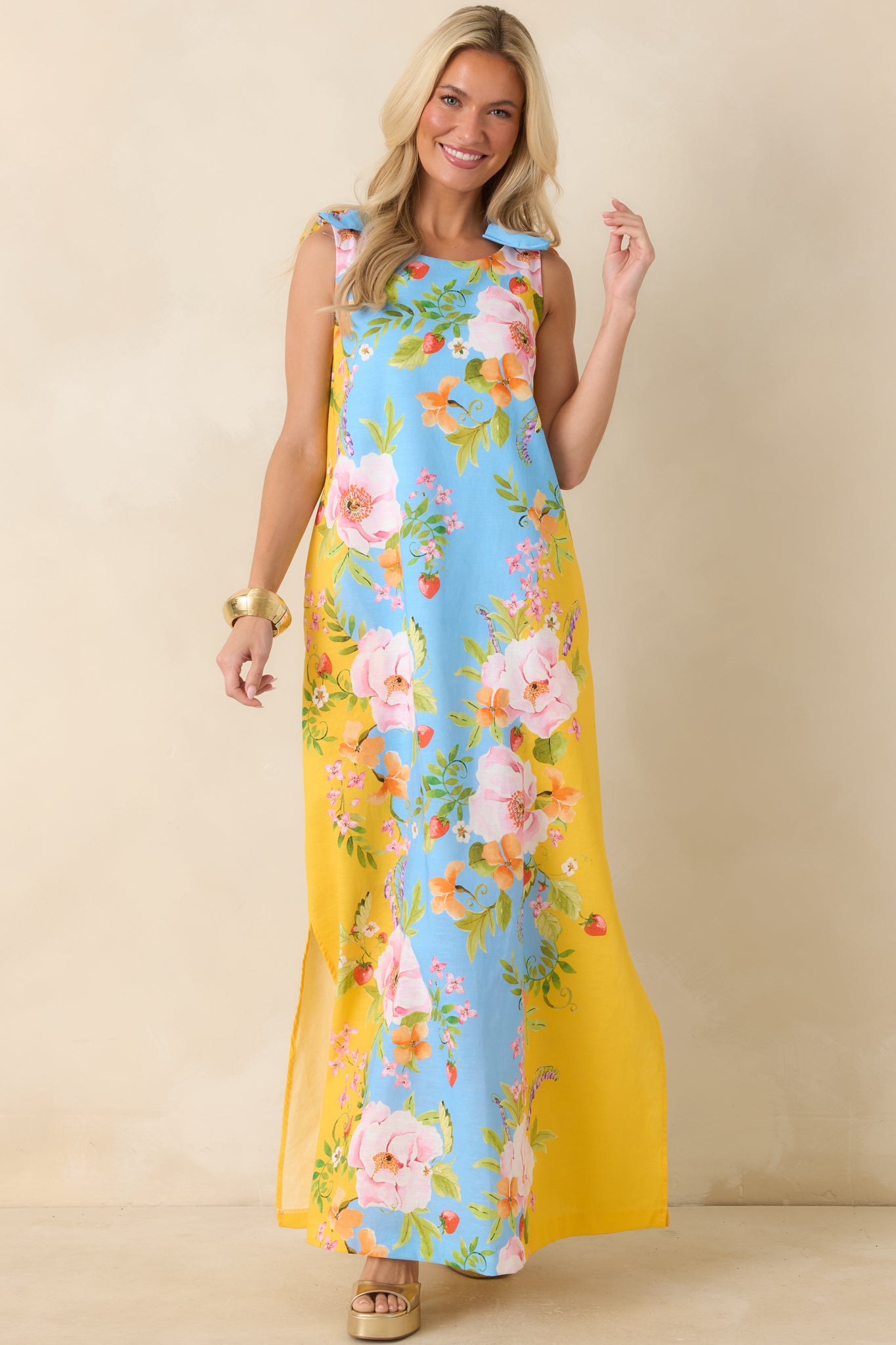 Linen blend floral maxi dress with colorful botanical print, side pockets, and an easy full-length fit.
