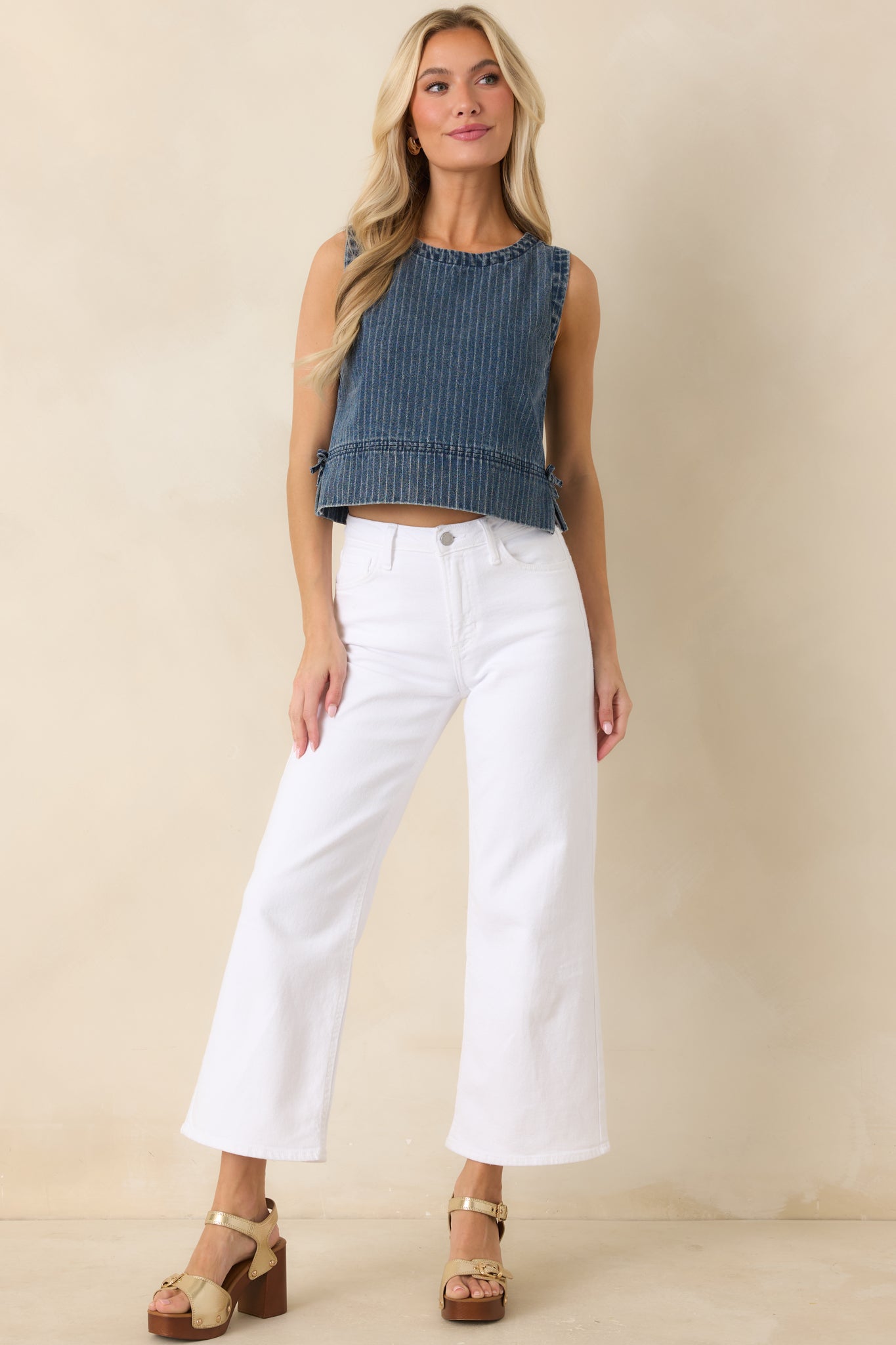 Front-facing view capturing the coordinated stripe layout, cropped hemline, and clean neckline for a minimal summer look.