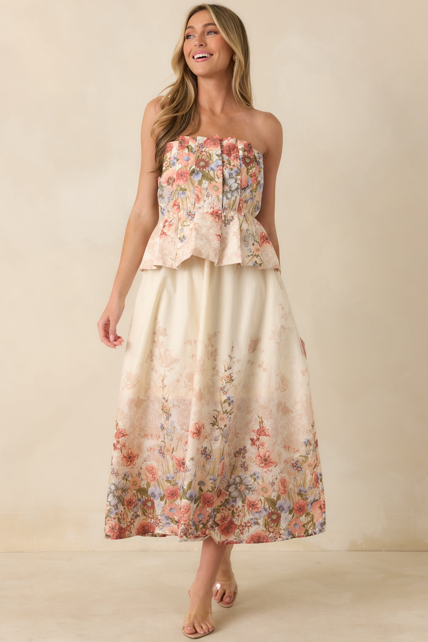 Strapless pink multi floral midi dress with pleated bodice and easy, gathered waist fit.
