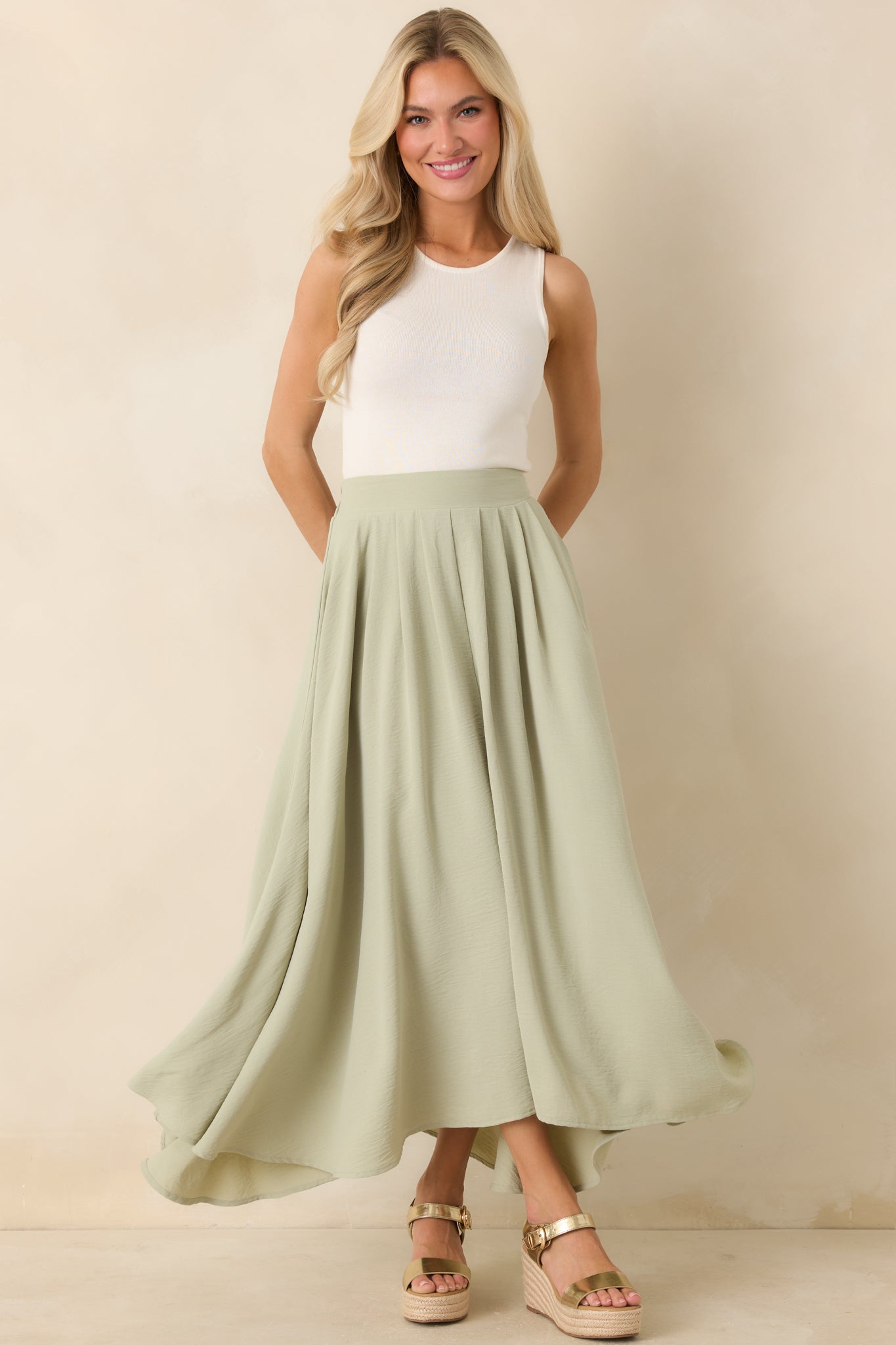 Sage green maxi skirt with full lining and an easy, airy shape.