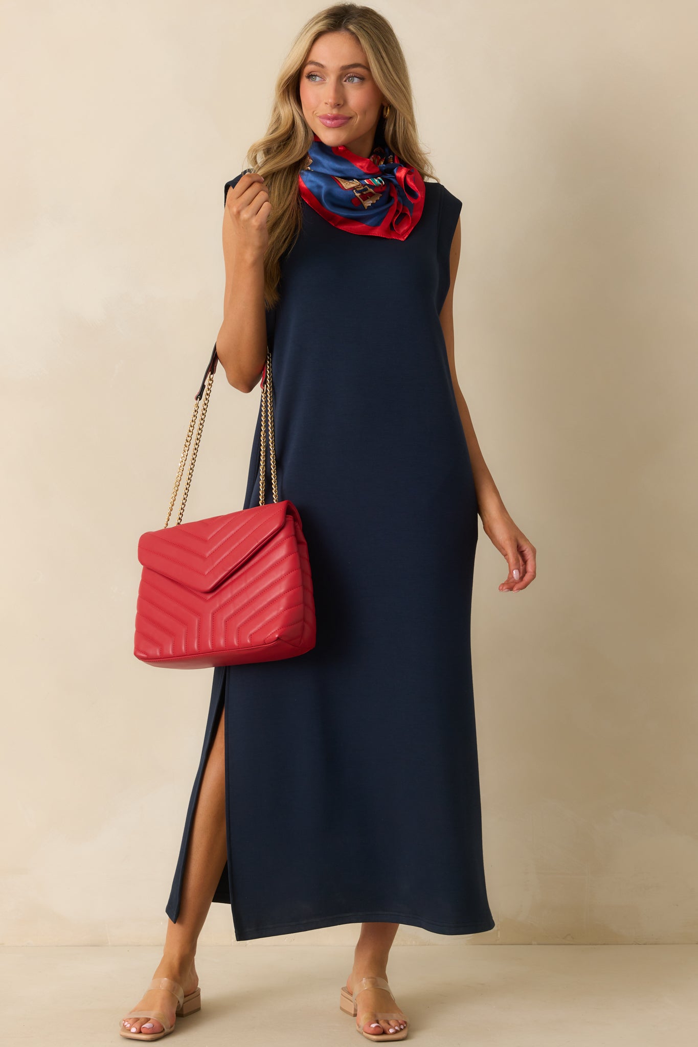 Full-length dress highlighting the relaxed shape and side slit details.