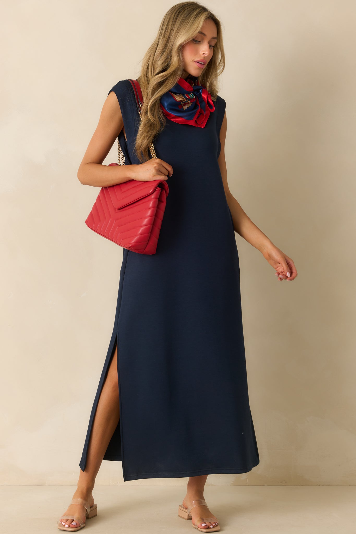 Navy maxi dress with a crew neckline and short cap sleeves.