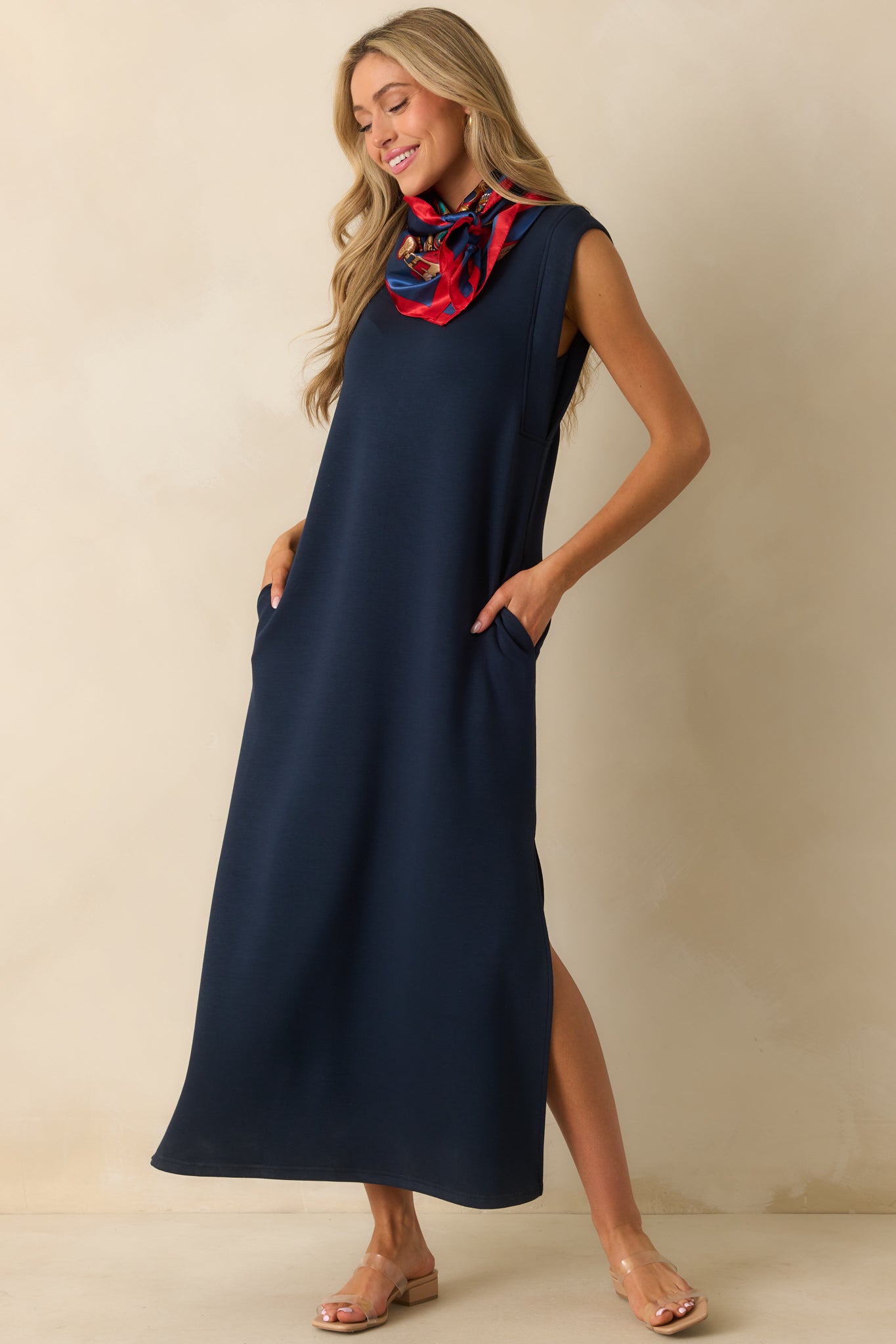 Navy maxi dress with side slits and soft cotton-blend fabric flowing naturally.