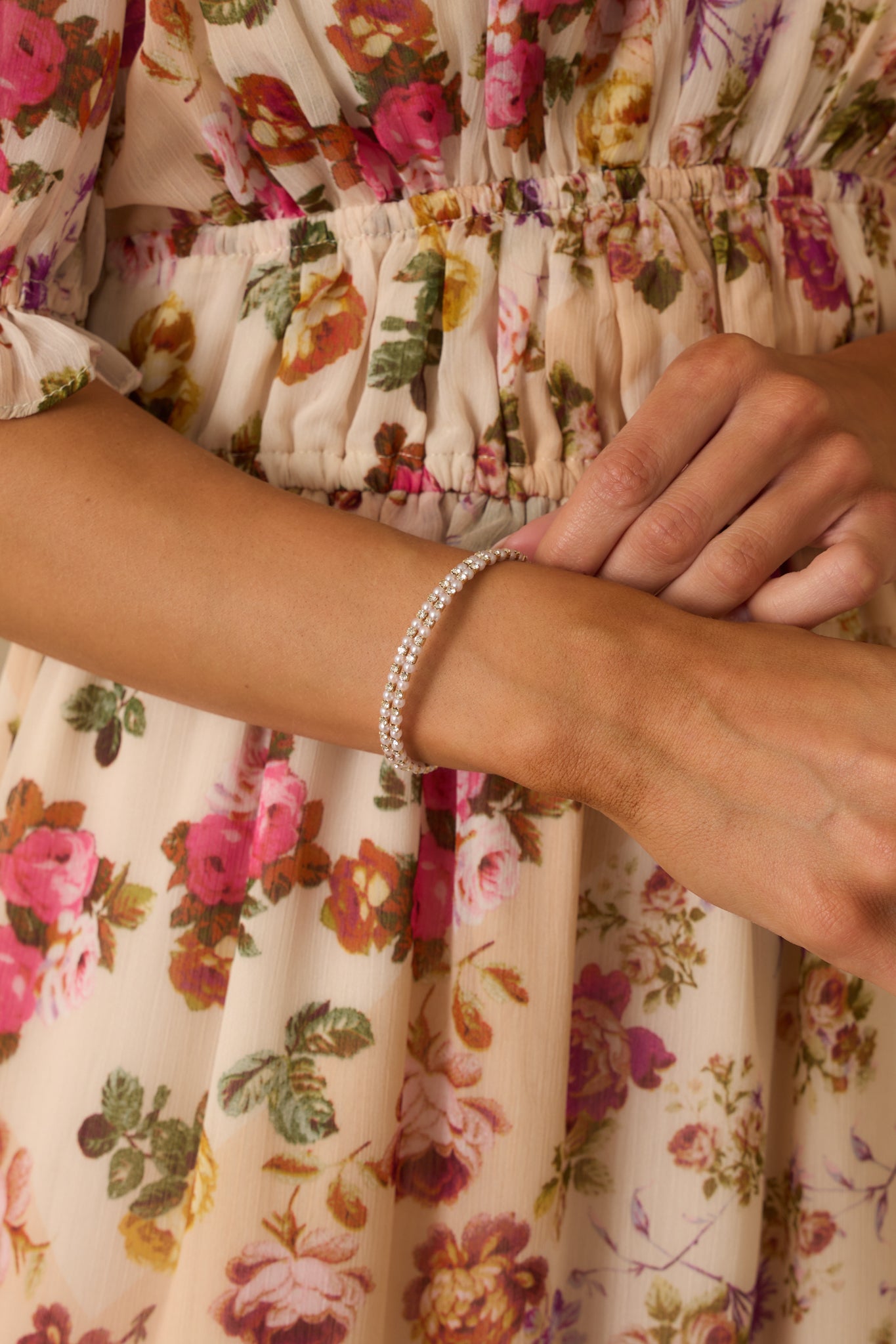 Flexible coil bracelet loops smoothly around itself, showing its wrap-around style.