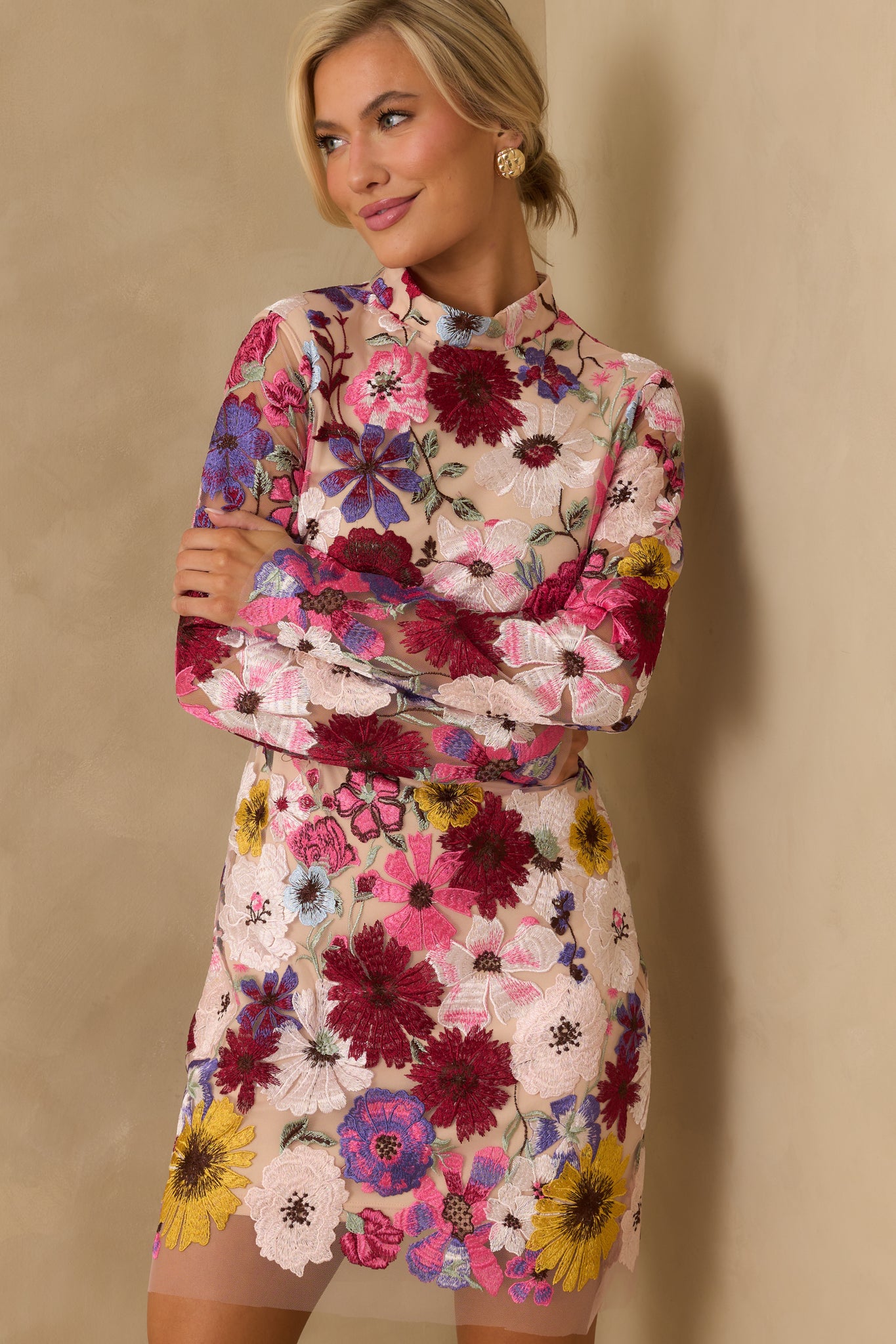 Cropped angle showing the fitted waistline and mini length hem.