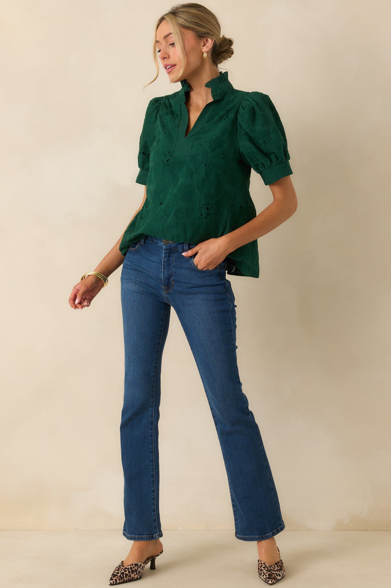 Short puff sleeve blouse featuring a relaxed fit and straight hemline.