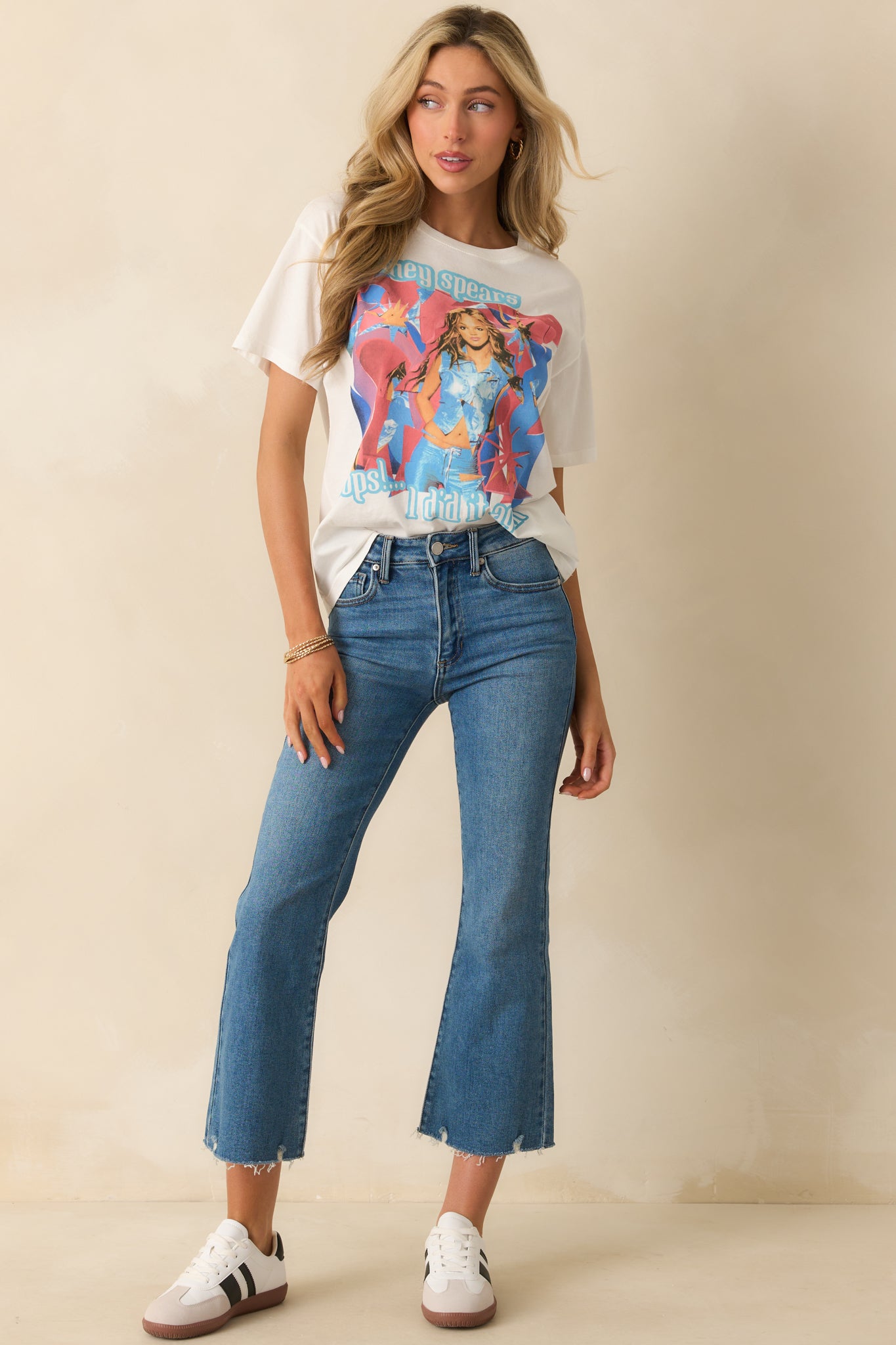 Front-facing full length shot of the jeans showcasing the raw hemline and straight cut.