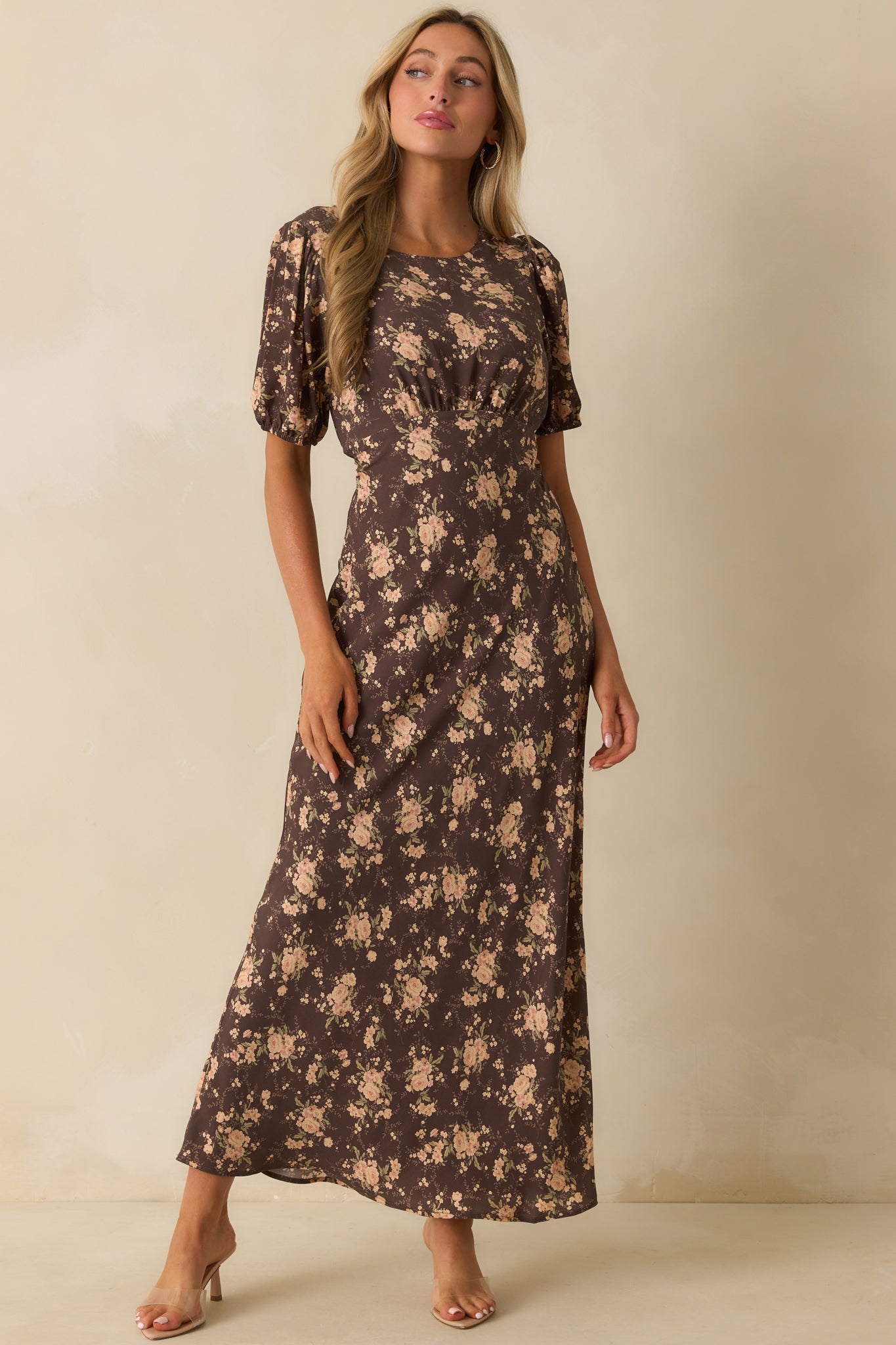 Printed dress showing puff sleeve shape and flowing skirt.