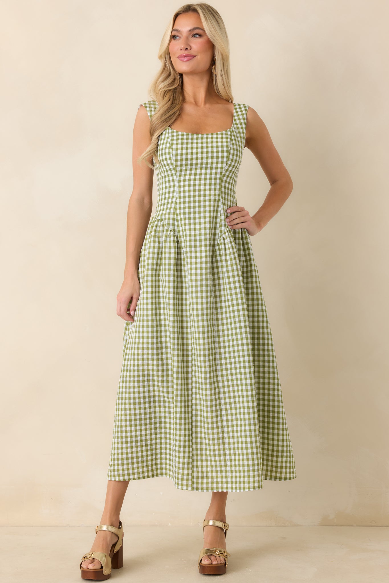 Cotton-blend midi dress in green gingham print with a square neckline and a full skirt that moves with ease.