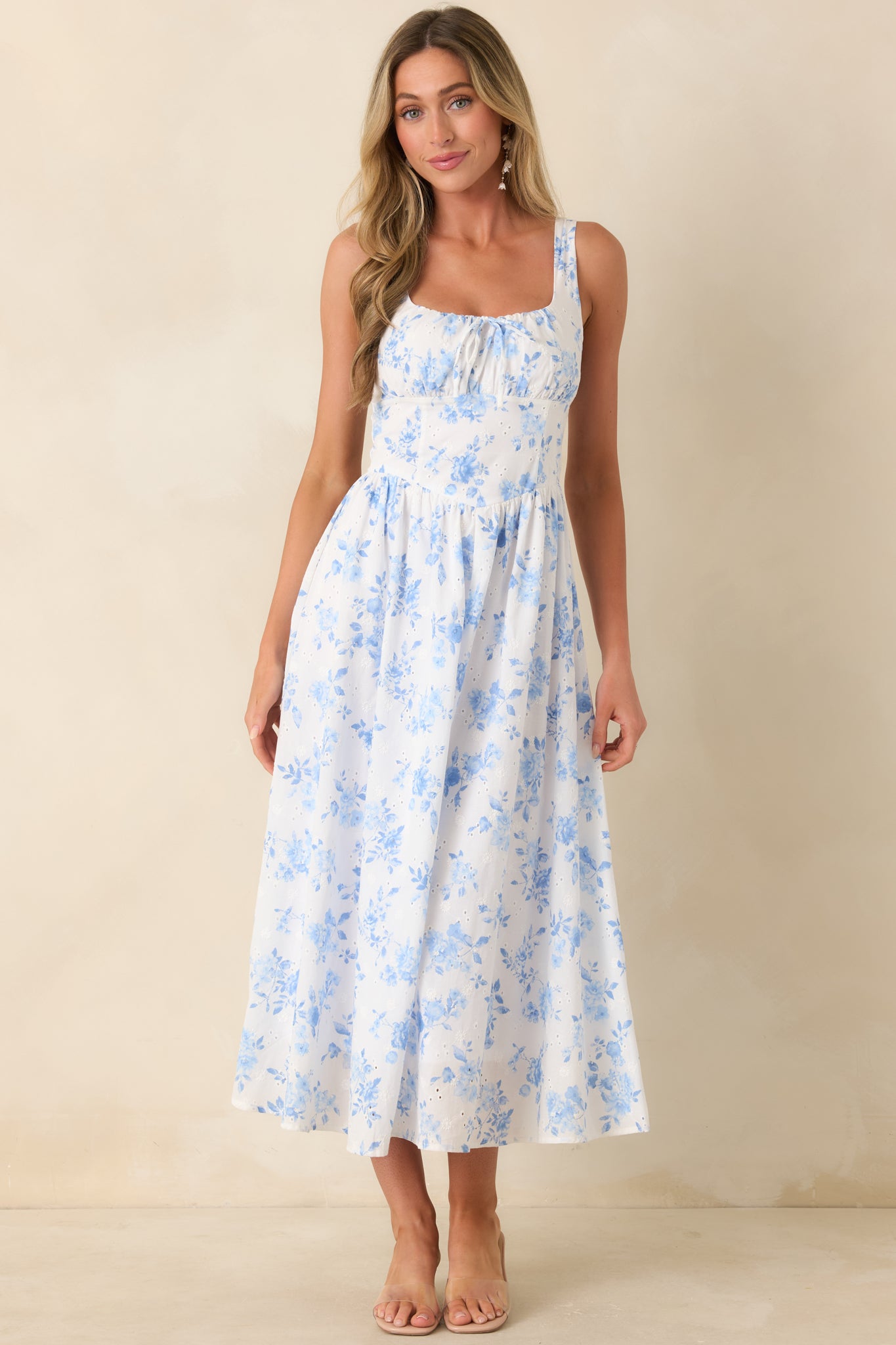 Relaxed fit dress with tie-front bodice detail and wide supportive straps.