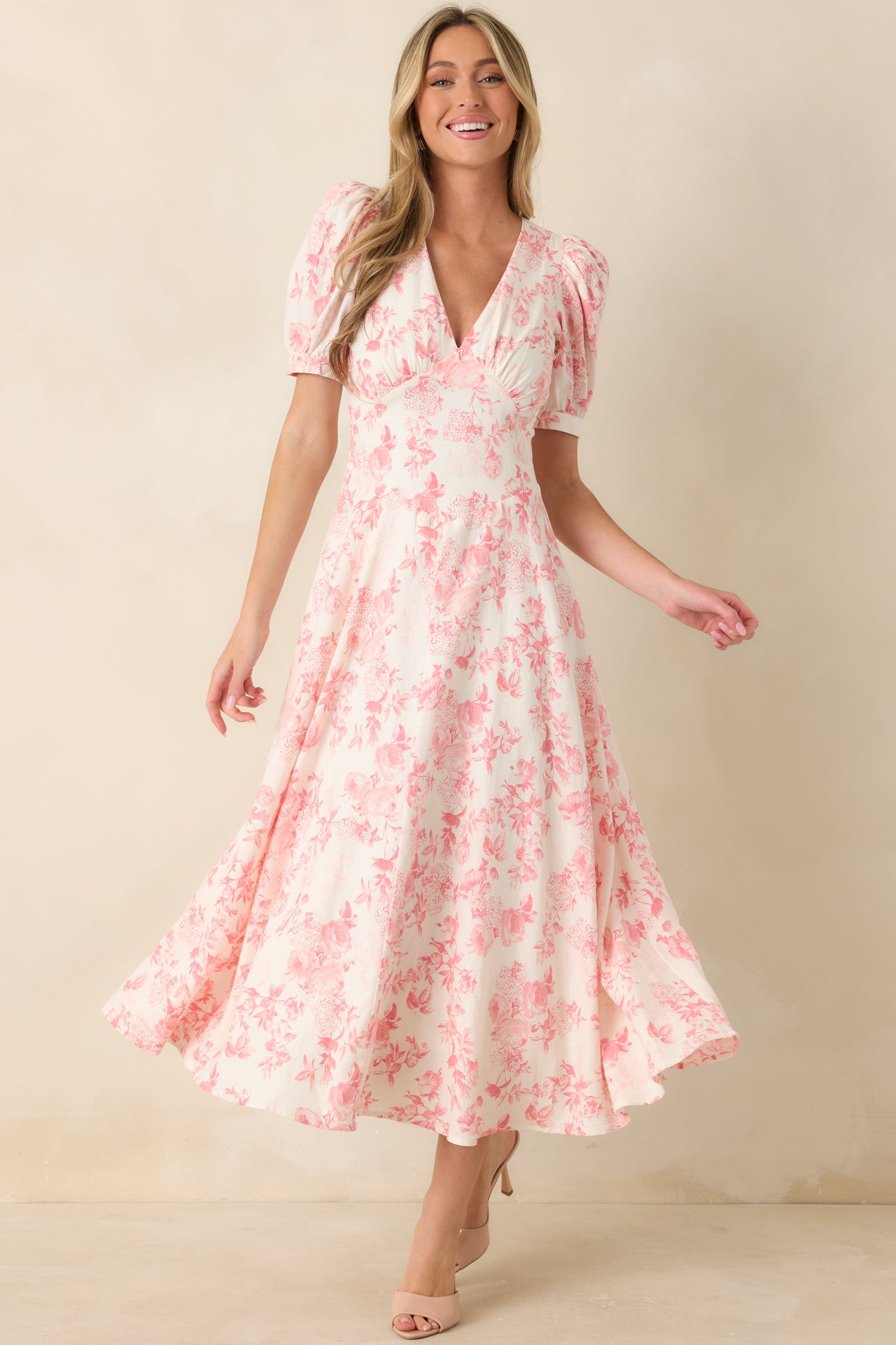 Pink floral linen blend maxi dress with short puff sleeves and an easy draped shape.