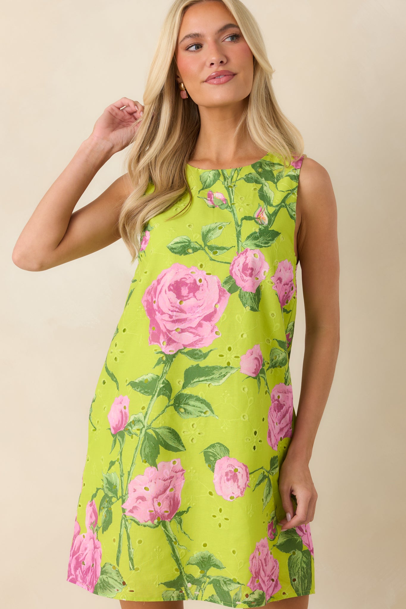 Cropped detail of sleeveless mini dress highlighting lightweight structure and airy weave.