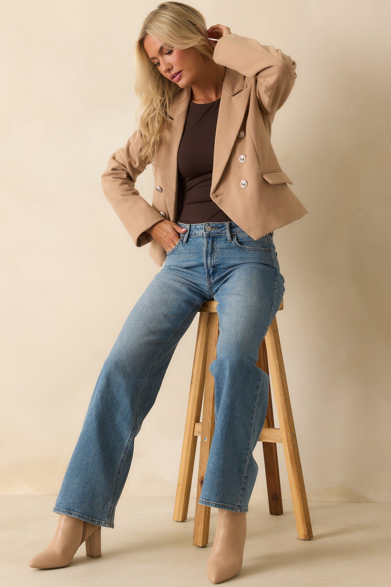 An alternate front angle highlighting long sleeves and functional front pockets.