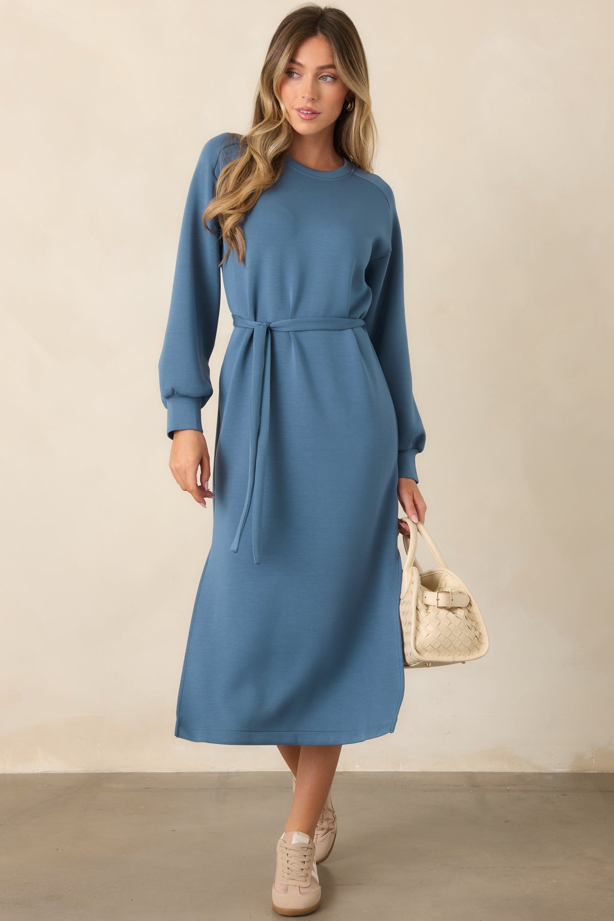 Blue long sleeve midi dress with ribbed cuffs and a coordinating fabric waist belt